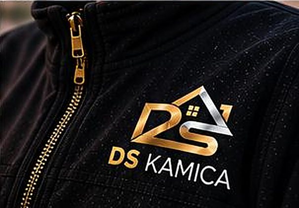 DS Kamica logo embroidered on a black work jacket